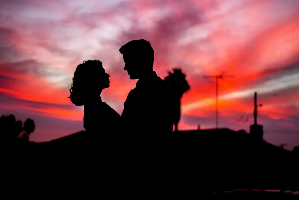 Romantic couple silhouette at sunset, ideal for exploring intimacy and sensual moments with Gaia in Love.