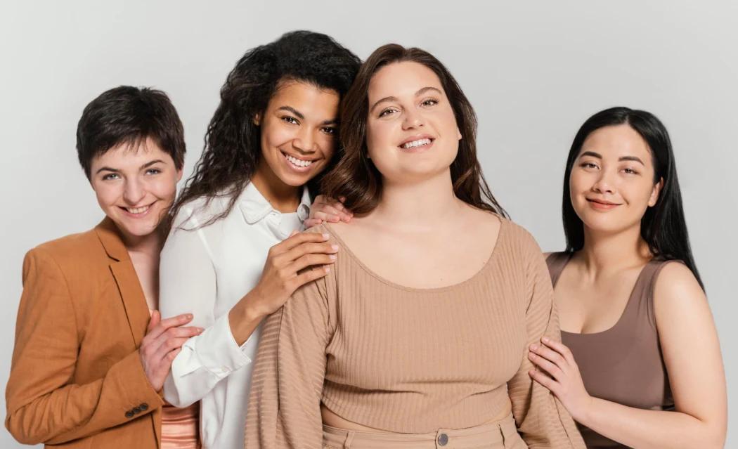 Women of all ages and backgrounds celebrating trust, empowerment, and integrity in a natural setting.