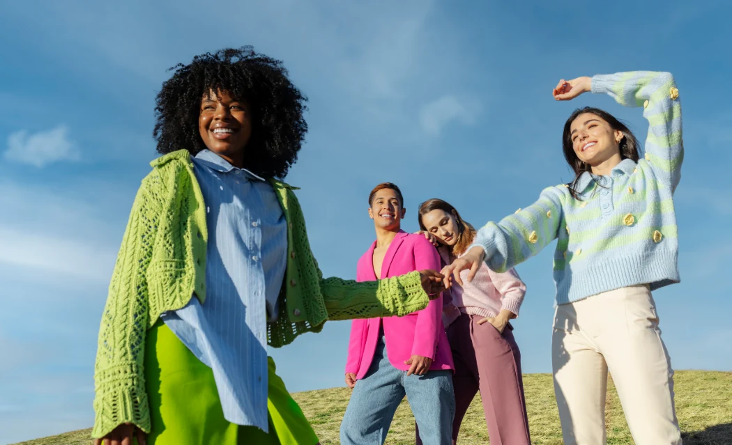 Diverse group of girls embracing progress and empowerment, symbolizing female empowerment and collaboration.