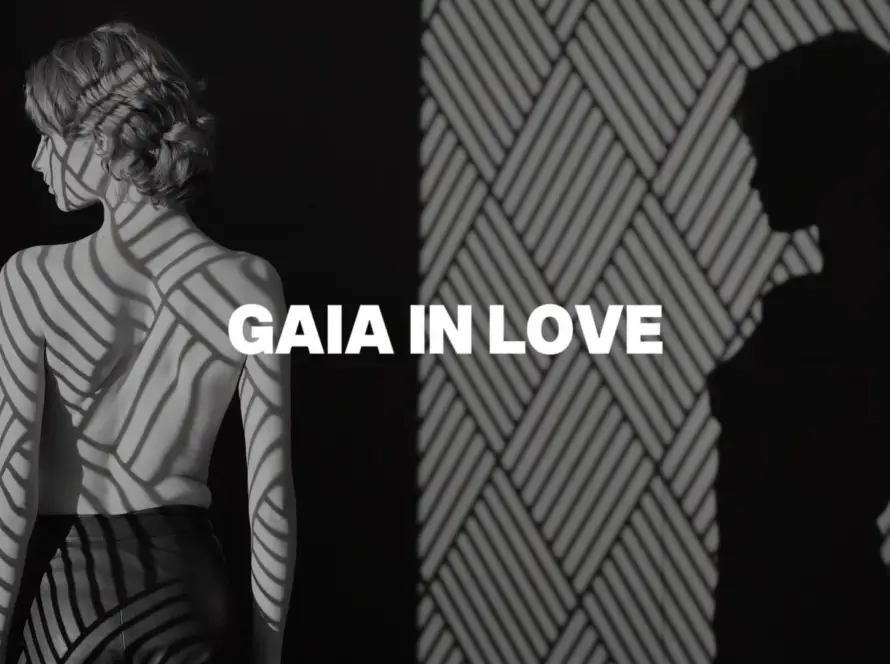 A bold and artistic black-and-white image of a woman in shadows, symbolizing self-expression and empowerment through Gaia in Love's philosophy of female masturbation and self-love.